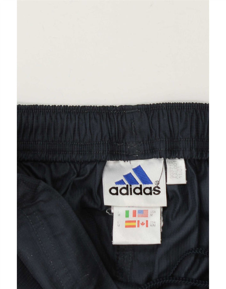 Pantaloni da tuta da uomo Adidas medi in poliestere blu navy