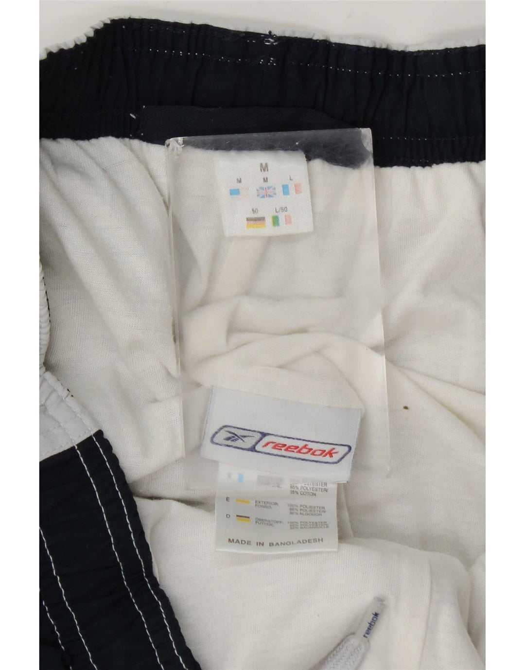 Pantaloncini sportivi Bermuda da uomo Reebok, poliestere color block grigio medio