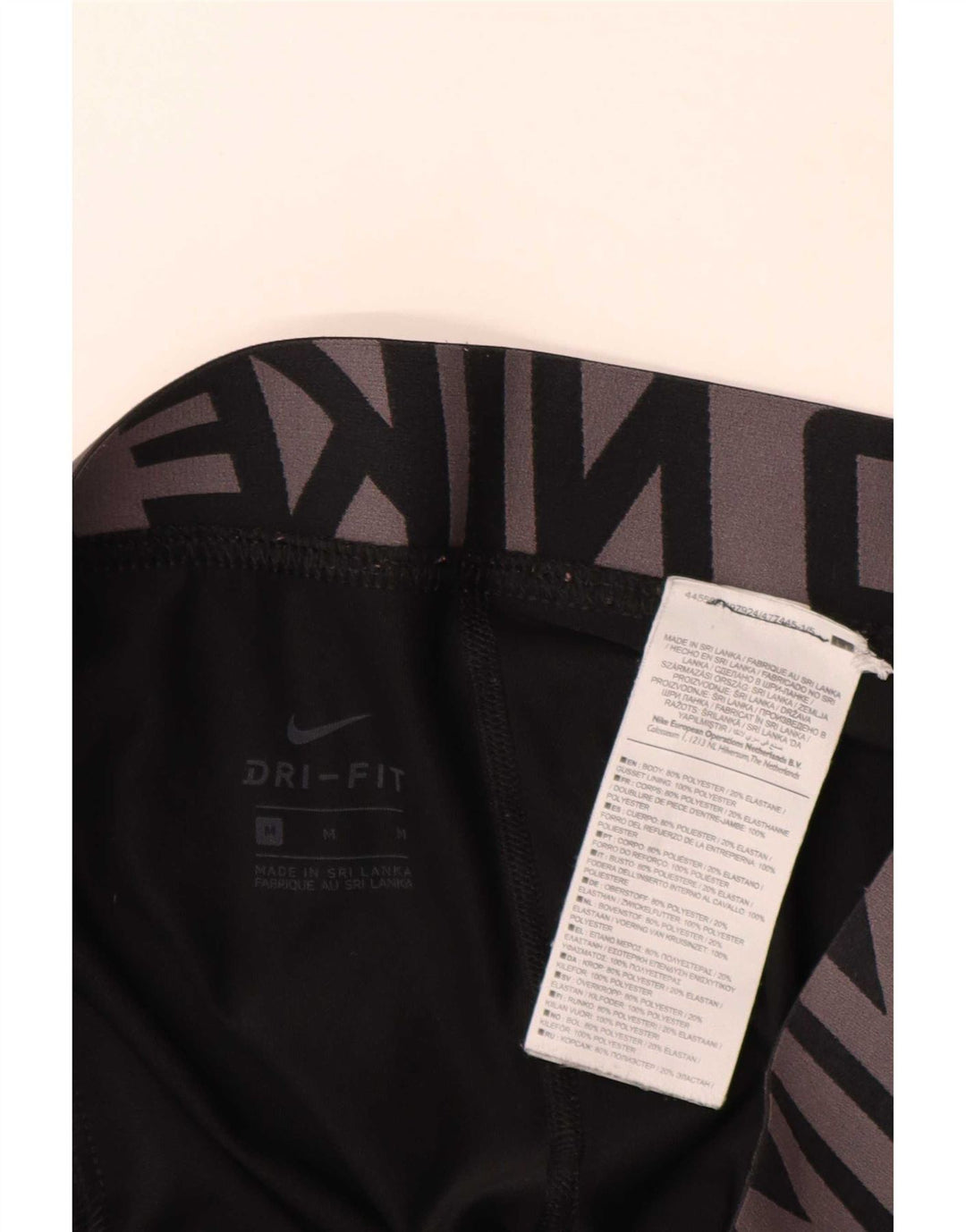 Leggings grafici Nike Dri Fit da donna UK 14 poliestere nero medio