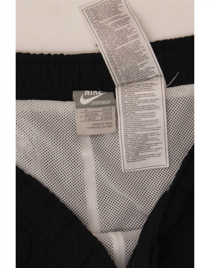 Pantaloni da tuta da uomo Nike Joggers medio poliestere blu navy