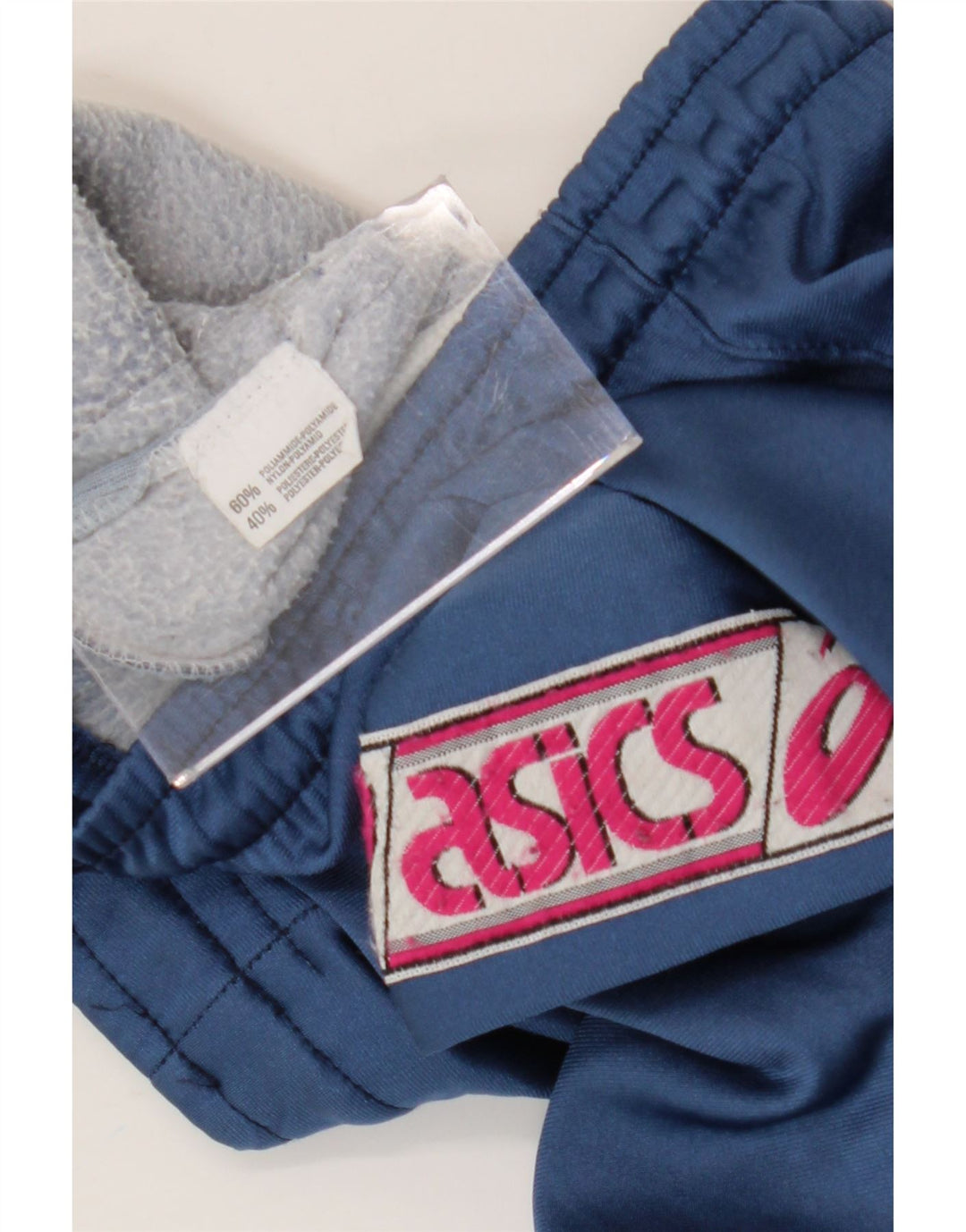 Pantaloni da tuta grafica da uomo Asics in poliammide color block blu medio