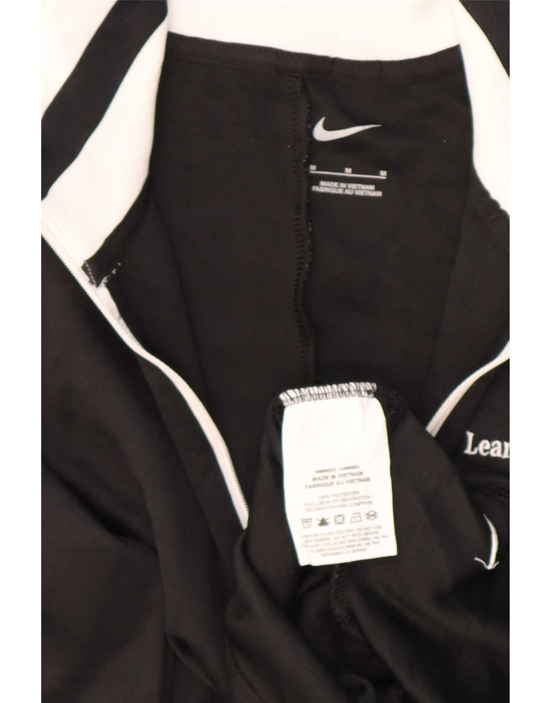 Top della tuta da ginnastica Nike da donna con collo e zip grafica, taglia UK 12, media, nera