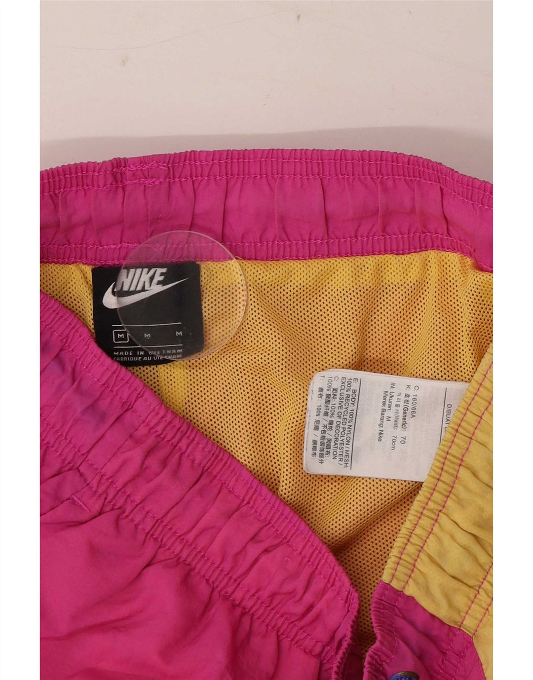 Pantaloncini sportivi Nike da uomo in nylon color block rosa medio