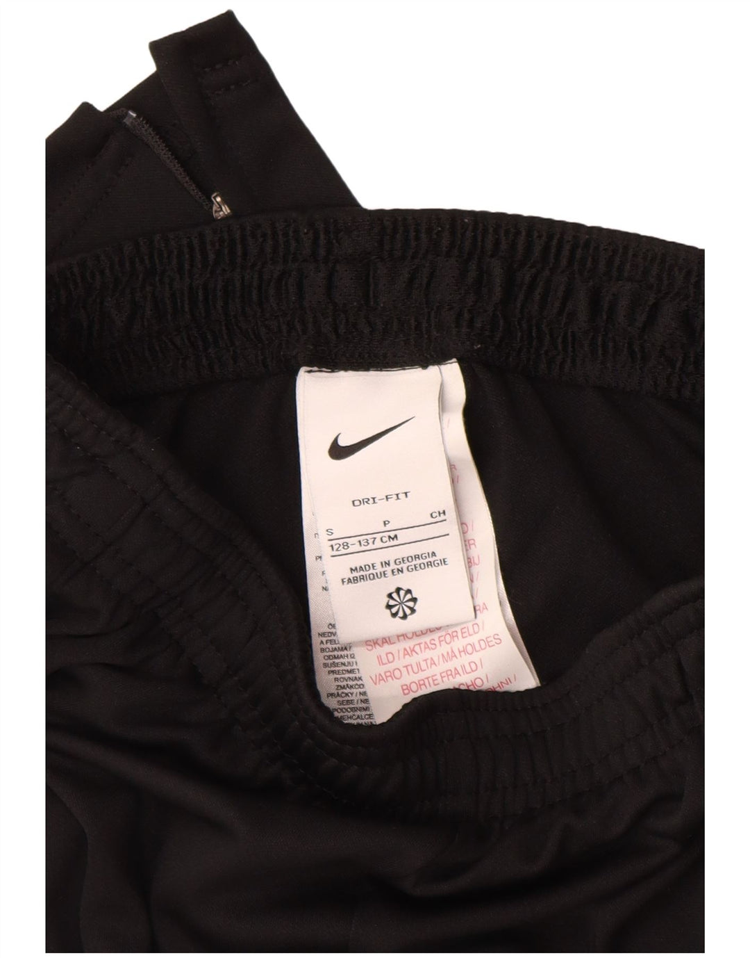 Pantaloni della tuta da ragazzo NIKE 8-9 anni piccoli in poliestere nero