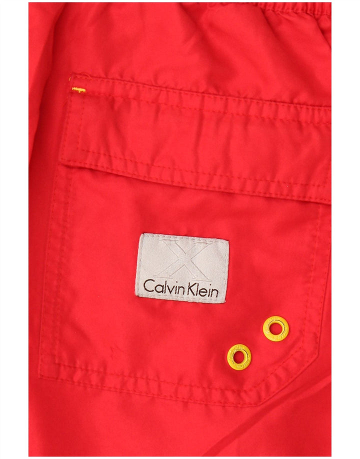 CALVIN KLEIN Pantaloncini da bagno da uomo con grafica Espana Graphic Block rosso medio