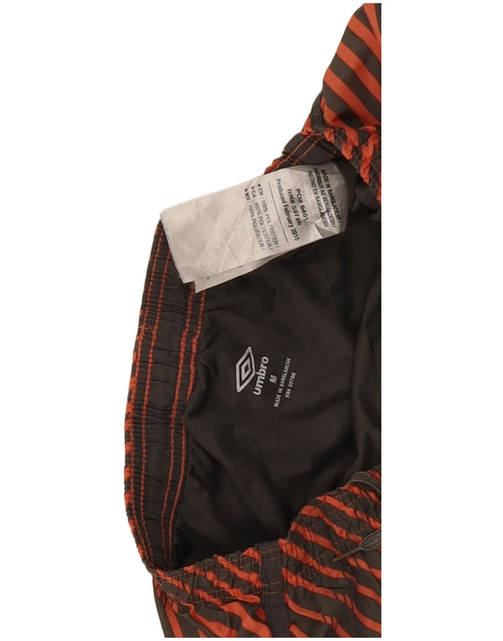Pantaloncini sportivi da uomo Umbro in poliestere a righe arancioni medie