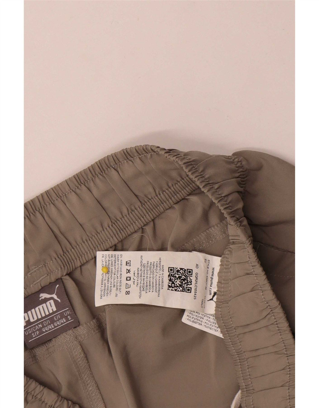 Pantaloncini sportivi Puma da donna piccoli in poliestere beige