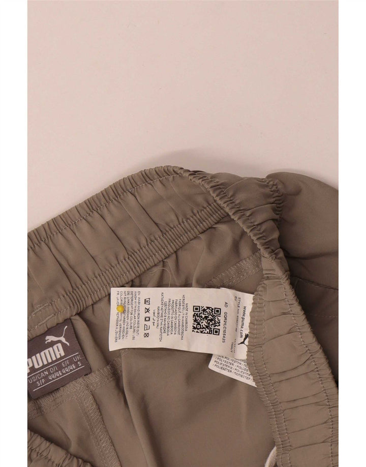 Pantaloncini sportivi Puma da donna piccoli in poliestere beige