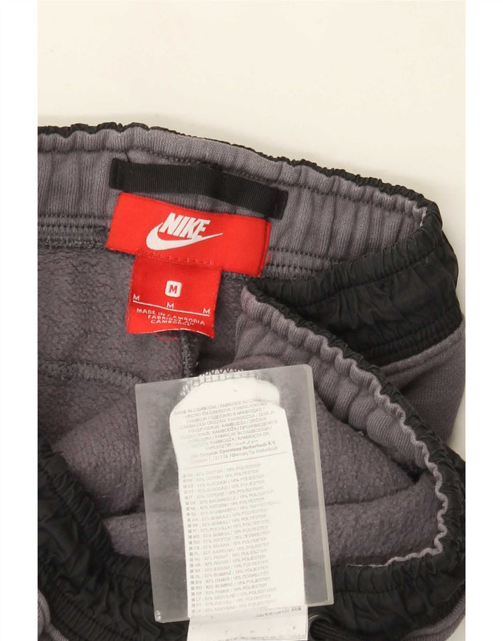 Pantaloni da tuta da uomo Nike Joggers in cotone grigio medio