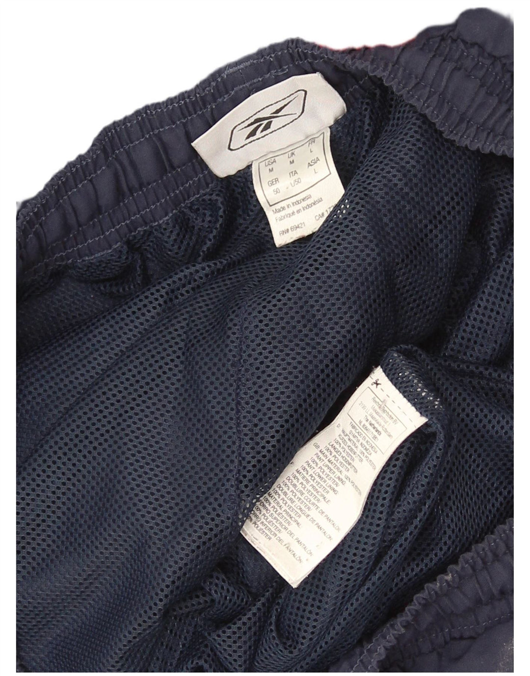 Pantaloni da tuta con grafica Reebok da uomo Joggers Medium Navy Blue Colourblock