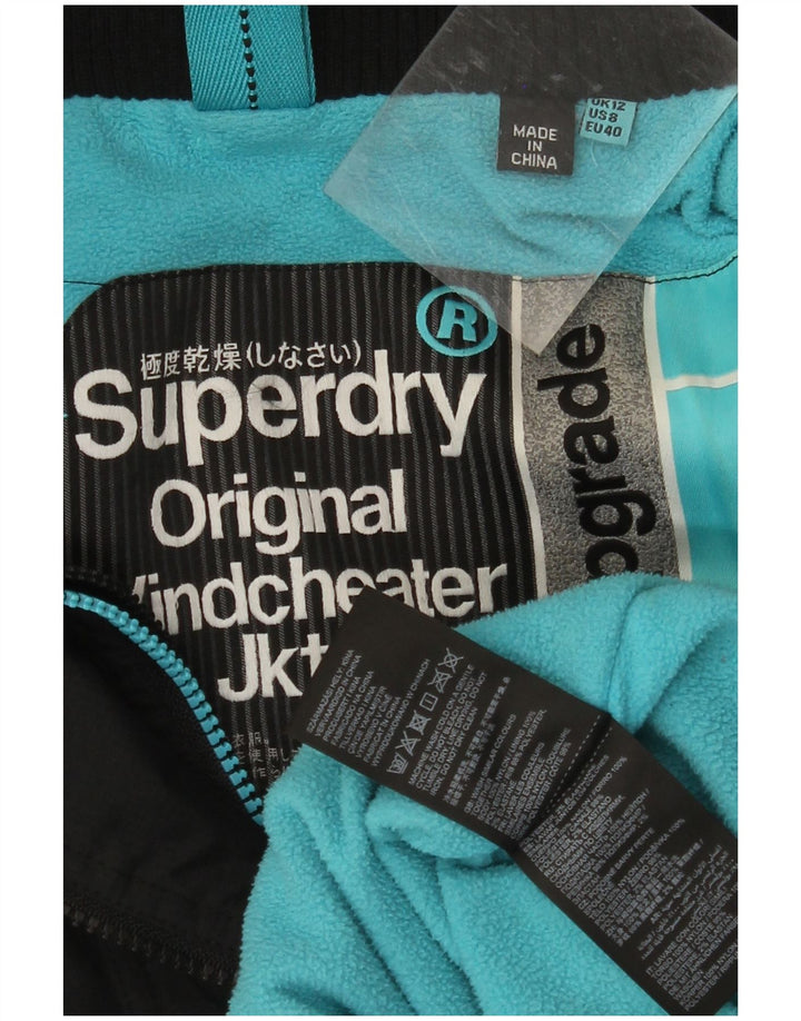 Giacca a vento da donna con cappuccio SUPERDRY UK 12 media nera