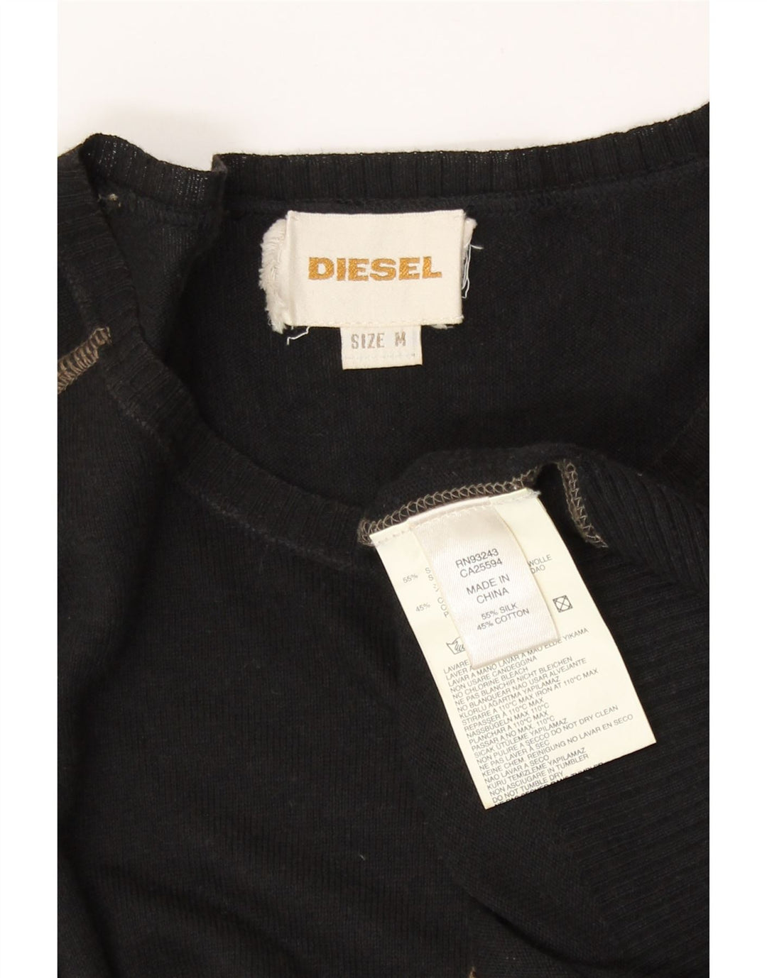 Maglione da uomo Diesel con scollo a barca in seta a righe nere medie