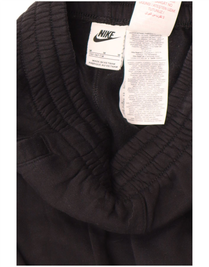 NIKE Boys Graphic Tracksuit Trousers Joggers 10-11 Years Medium Black
