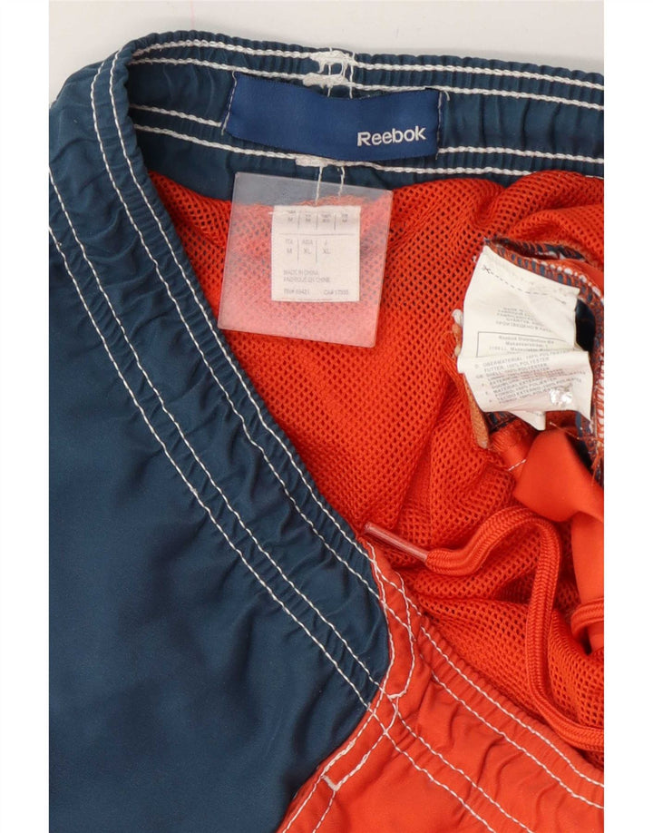 Pantaloncini da bagno grafici da uomo Reebok, poliestere color block arancione medio