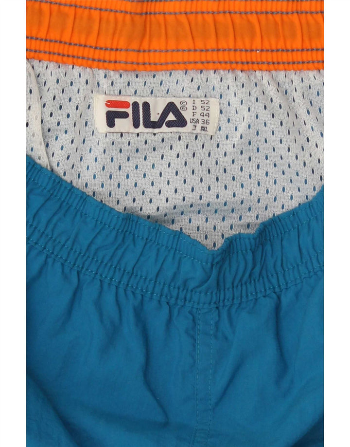 Pantaloncini da bagno da uomo Fila Large in poliestere color block blu