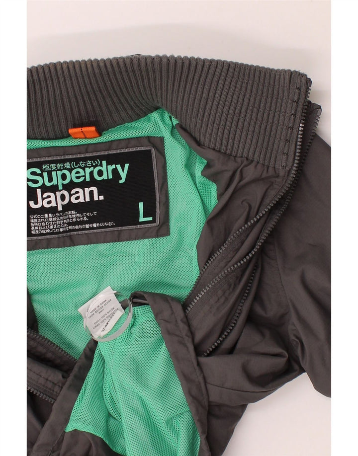SUPERDRY Womens Rain Jacket UK 16 Large Grey Nylon Vintage Superdry and Second-Hand Superdry from Messina Hembry 