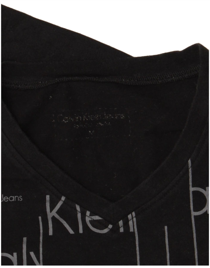 Calvin Klein Jeans Top grafico da donna manica lunga UK 12 medio nero