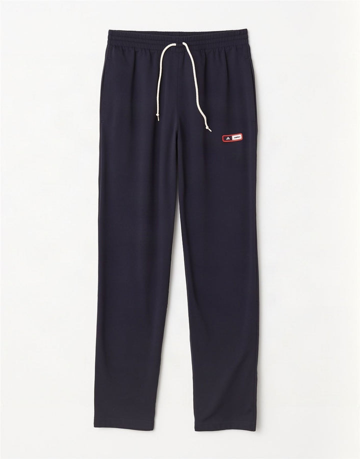 Pantaloni da tuta da uomo Adidas medi in poliestere blu navy
