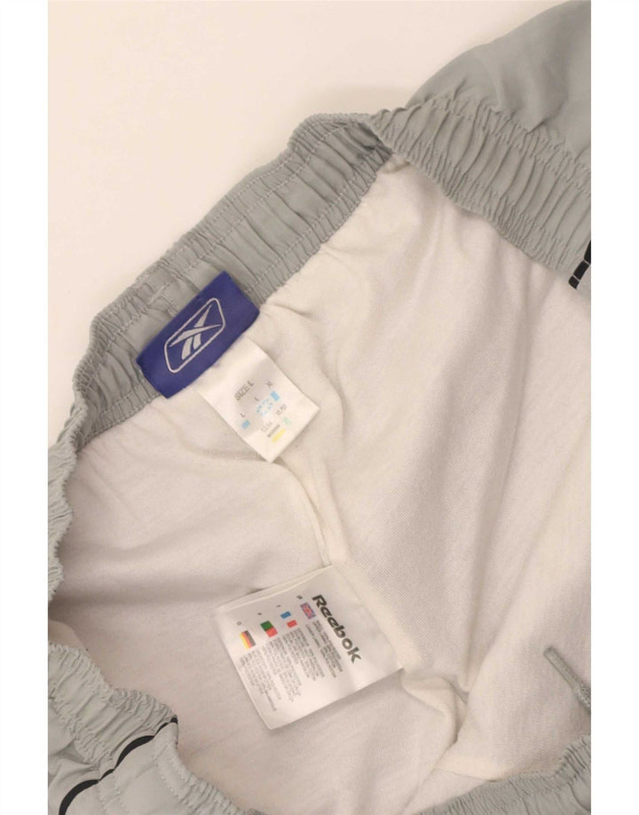 Pantaloni da tuta da uomo Reebok Joggers Large Grigio Poliestere