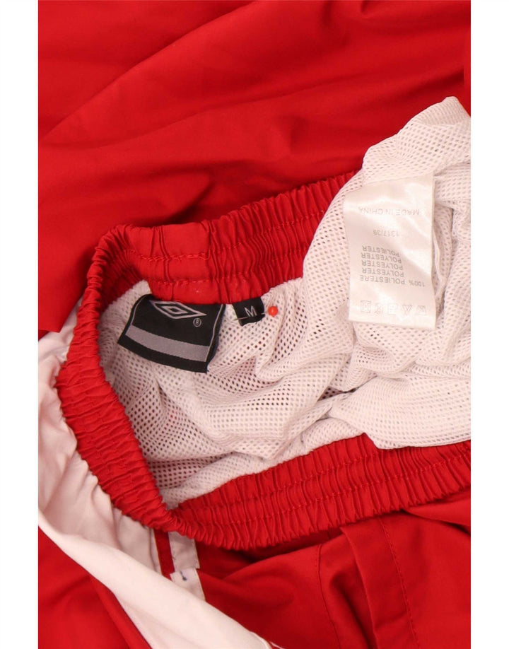 Pantaloni da tuta da uomo Umbro in poliestere color block rosso medio