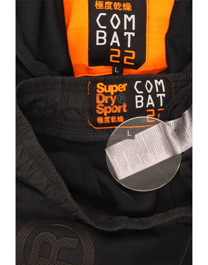 Tuta intera da uomo con grafica Superdry Large in cotone nero