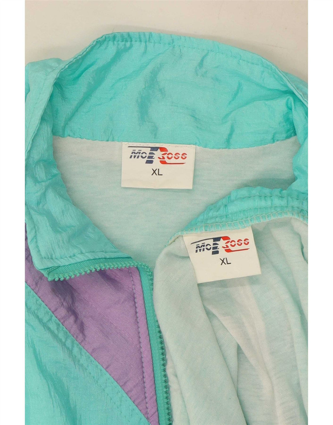 Tuta intera da uomo MC Ross XL in nylon color block turchese