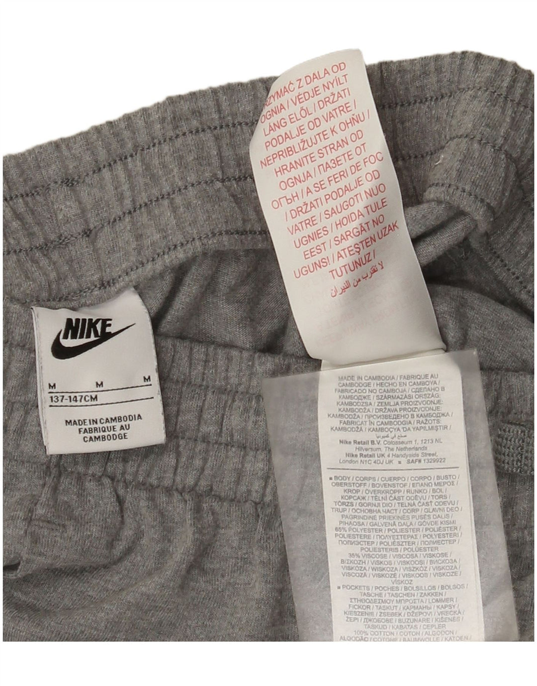 Pantaloncini sportivi Nike da ragazzo 10-11 anni in poliestere grigio medio
