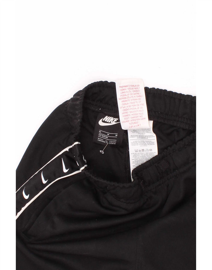 Pantaloncini sportivi Nike da ragazzo con grafica 10-11 anni, poliestere nero medio