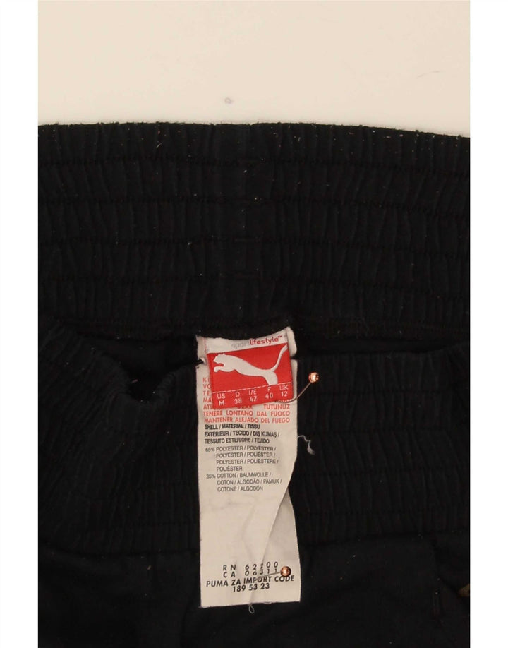 Pantaloni da tuta da donna Puma Capri Joggers UK 12 Medium Nero Poliestere