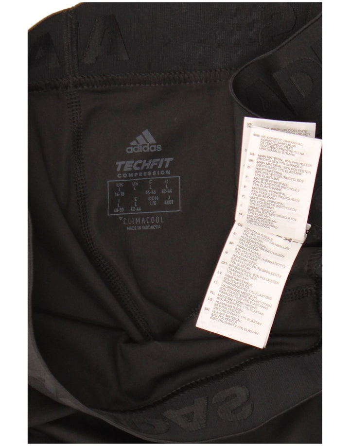 Leggings Adidas Tech Fit Capri da donna UK 16/18 Large Nero Poliestere