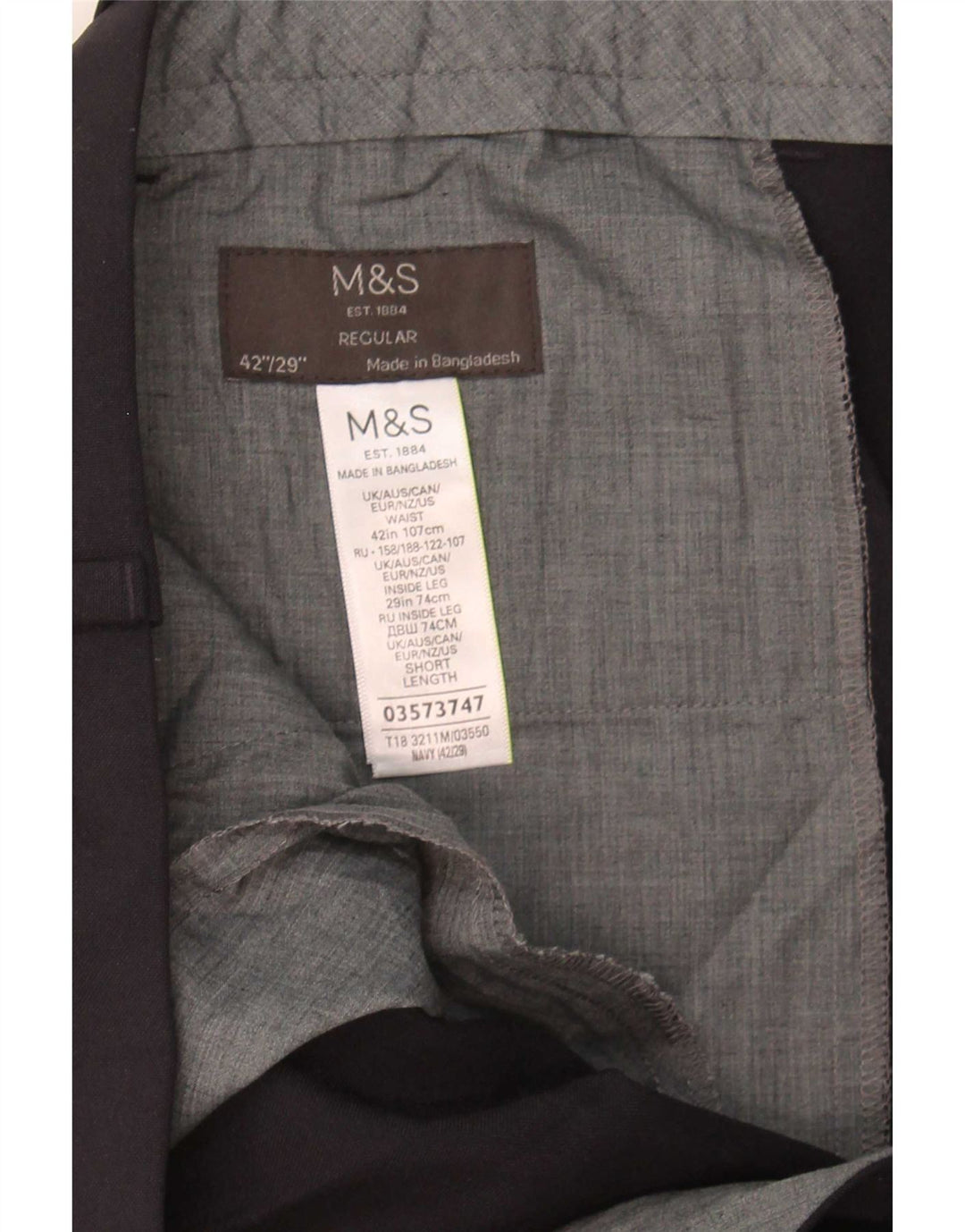 Pantaloni da abito regolari con pegging da uomo Marks & Spencer W42 L29 Blu Navy