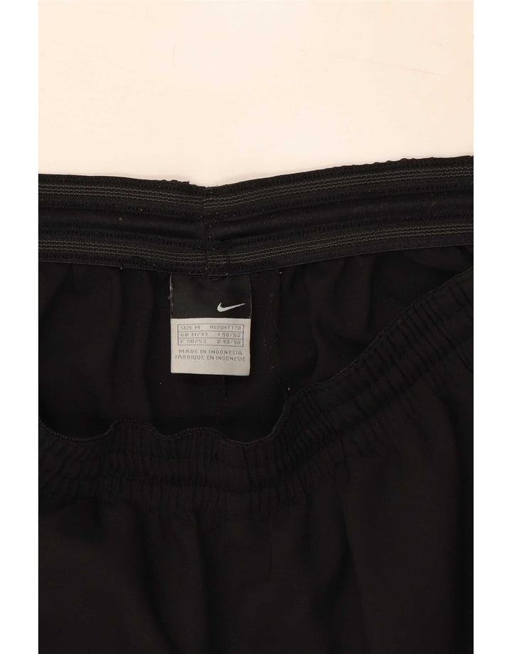 Pantaloncini sportivi Nike da uomo color block medio nero