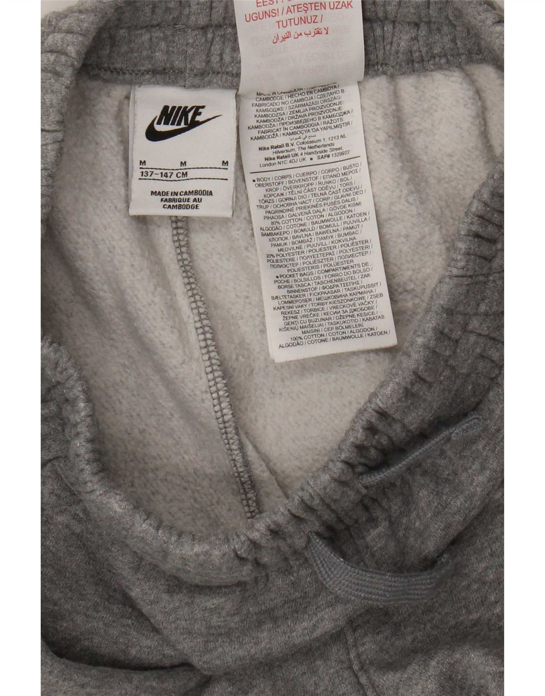 Pantaloni della tuta da ragazzo Nike Joggers 10-11 anni in cotone grigio medio