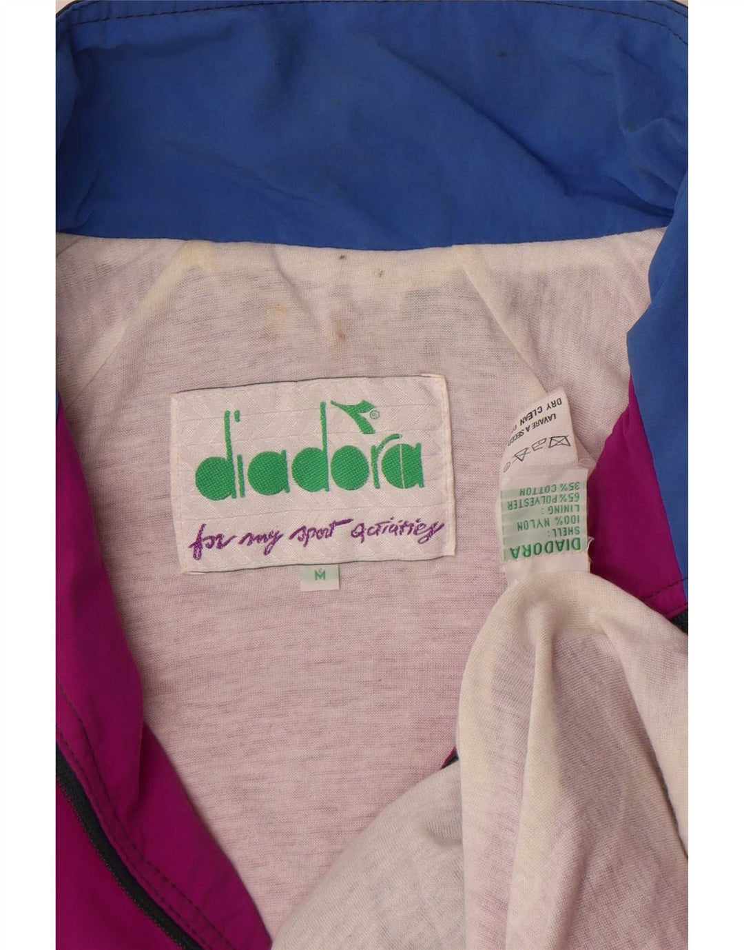 Giacca da tuta grafica da uomo Diadora in nylon color block rosa medio