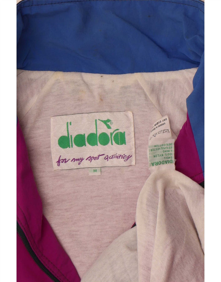 Giacca da tuta grafica da uomo Diadora in nylon color block rosa medio
