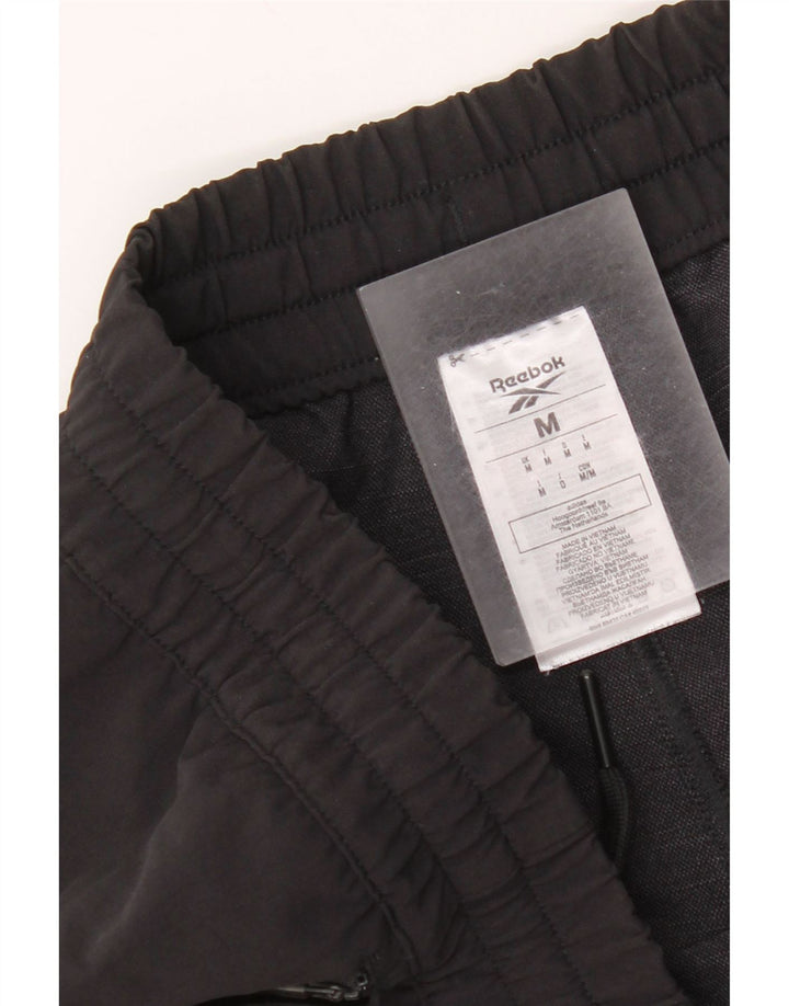 Pantaloni da tuta da uomo Reebok Medium neri in poliammide