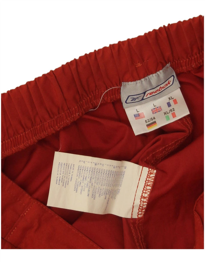 Pantaloni da tuta da uomo Reebok Large arancione in poliestere