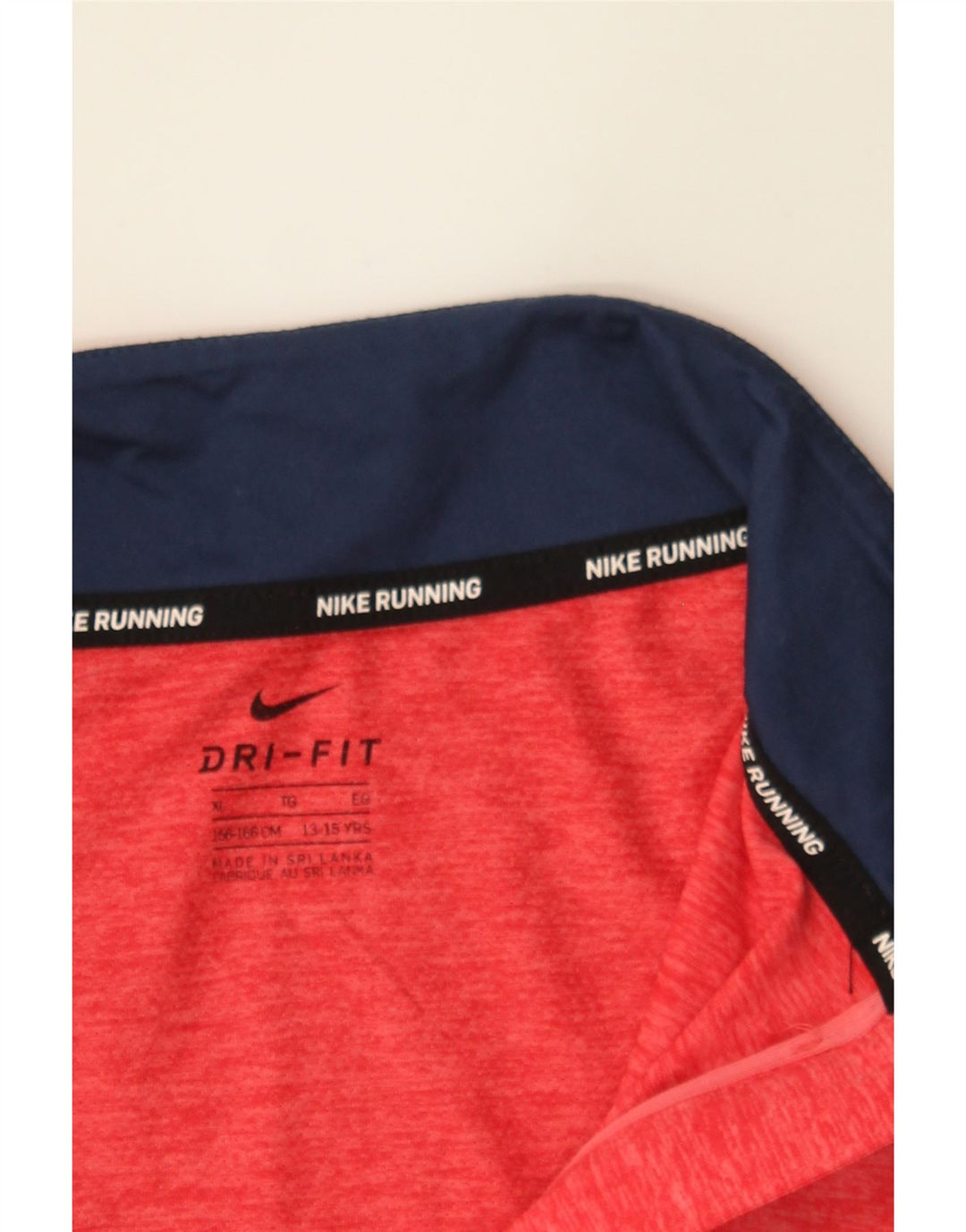 NIKE Girls Zip Neck Pullover Tracksuit Top 13-14 Years XL Red Colourblock Vintage Nike and Second-Hand Nike from Messina Hembry 