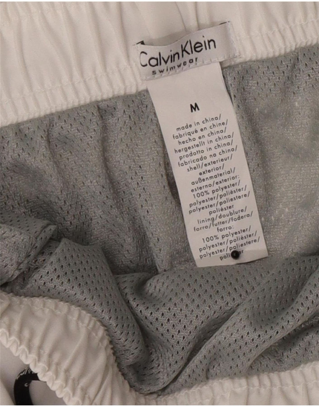 Pantaloncini da bagno grafici da uomo Calvin Klein a blocchi di colore bianco medio