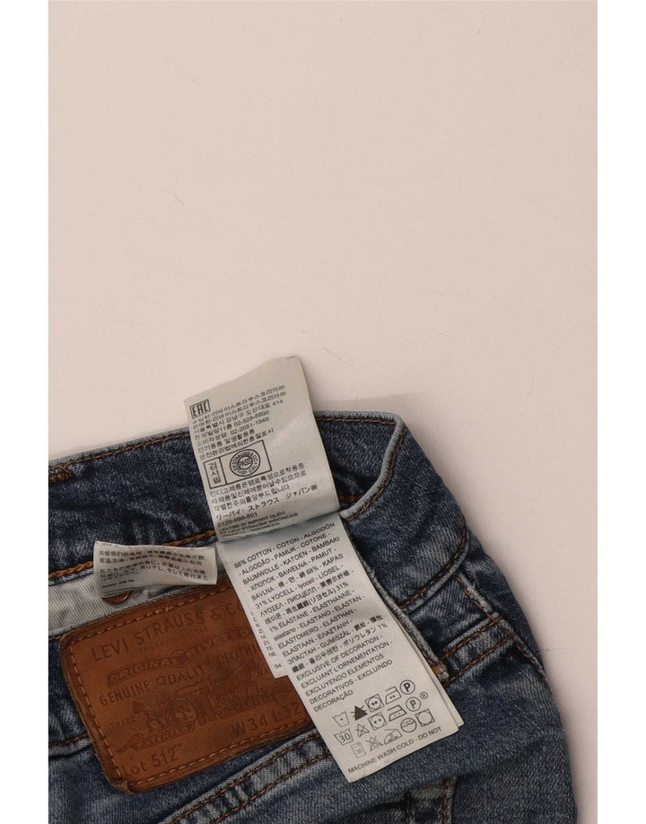 Levi's Uomo 512 Jeans affusolati slim effetto consumato W34 L32 cotone blu