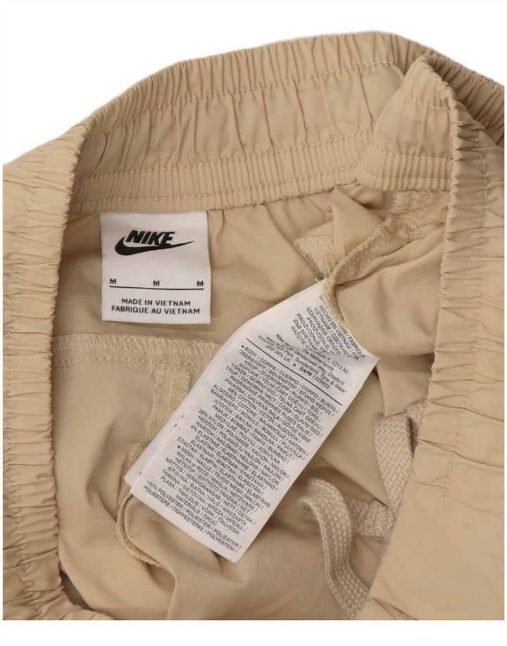 Pantaloncini cargo Nike da uomo medi W34 in cotone beige