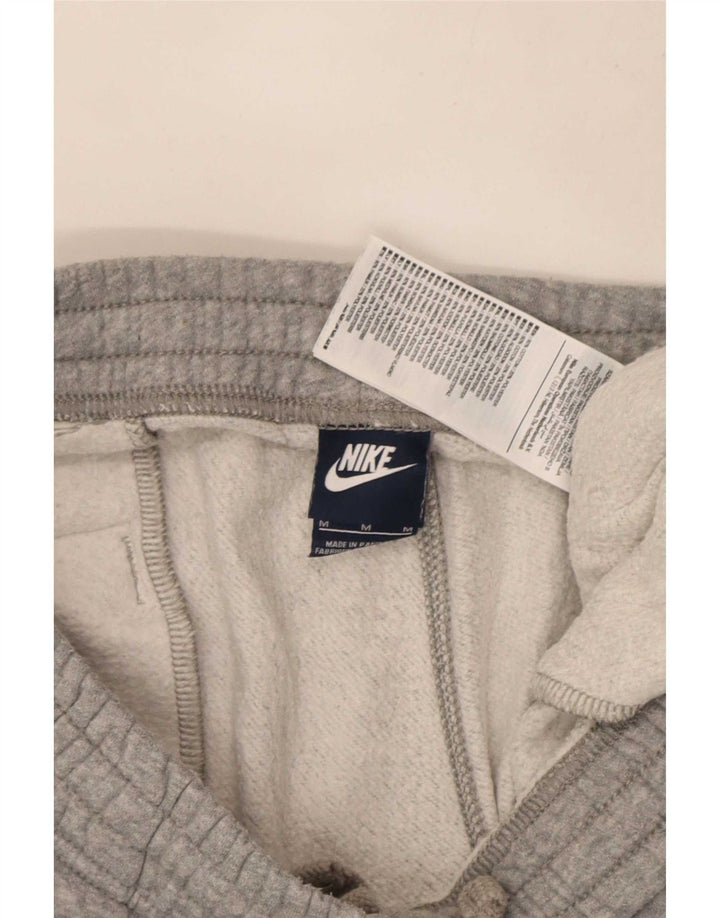 Pantaloni della tuta da uomo Nike in cotone grigio medio