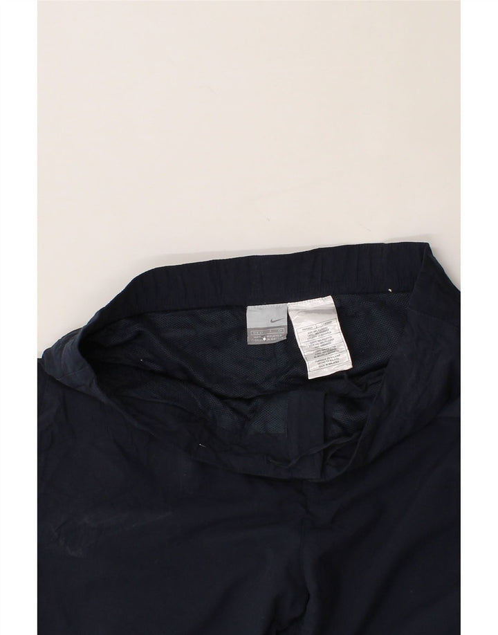 NIKE Womens Tracksuit Trousers US 4/6 Small  Navy Blue Polyester Vintage Nike and Second-Hand Nike from Messina Hembry 
