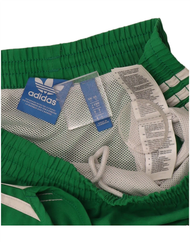 Pantaloncini sportivi Adidas da donna piccoli in poliestere verde
