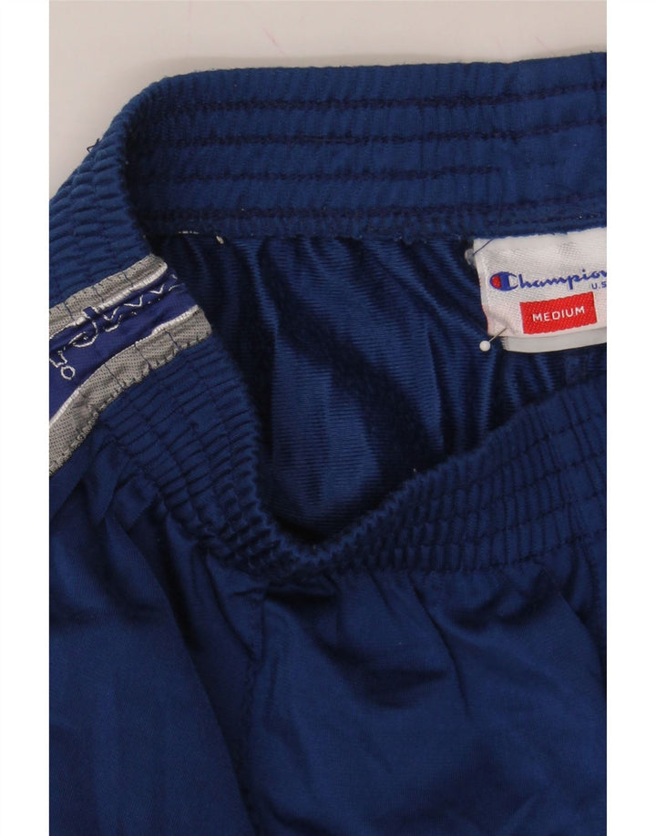 CHAMPION Mens Graphic Tracksuit Trousers Medium  Navy Blue Polyester Vintage Champion and Second-Hand Champion from Messina Hembry 
