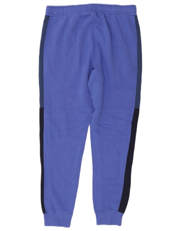 Pantaloni da tuta da uomo Nike Joggers in cotone color block blu medio