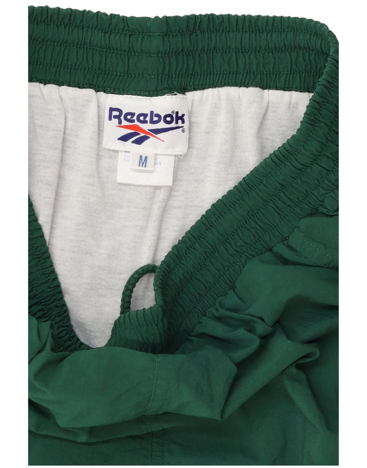 Pantaloncini sportivi Reebok da uomo in nylon verde medio