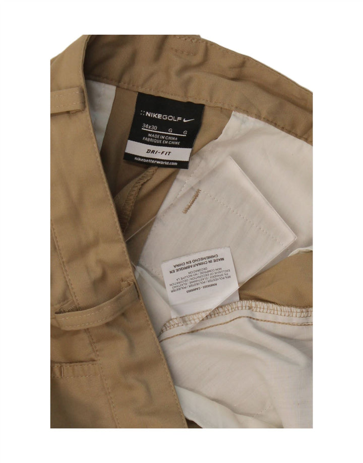 Pantaloni chino dritti NIKE Dri Fit da uomo W34 L30 poliestere beige