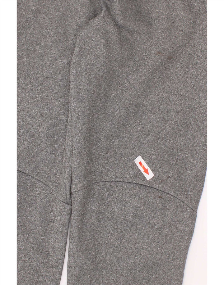 Pantaloni da tuta Nike da ragazzo Dri Fit Joggers 5-6 anni Grigio medio chiazzato