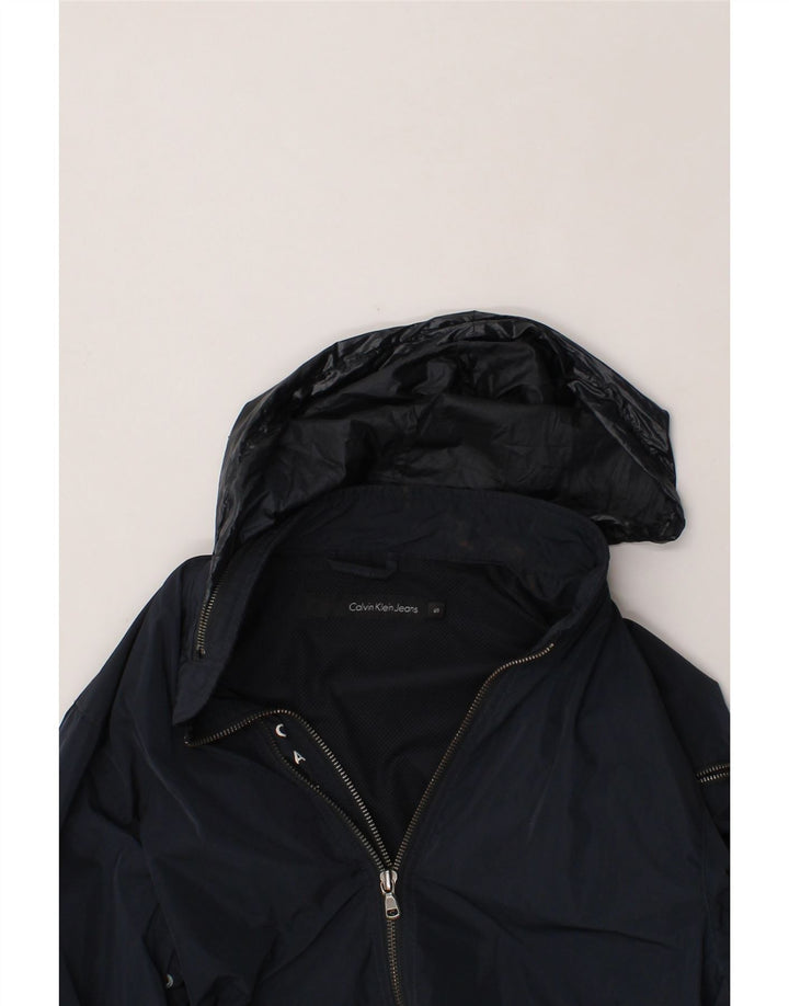 CALVIN KLEIN JEANS Womens Hooded Rain Jacket UK 10 Small Navy Blue Vintage Calvin Klein Jeans and Second-Hand Calvin Klein Jeans from Messina Hembry 